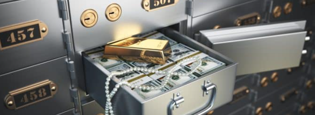 Safe deposit box with money and gold